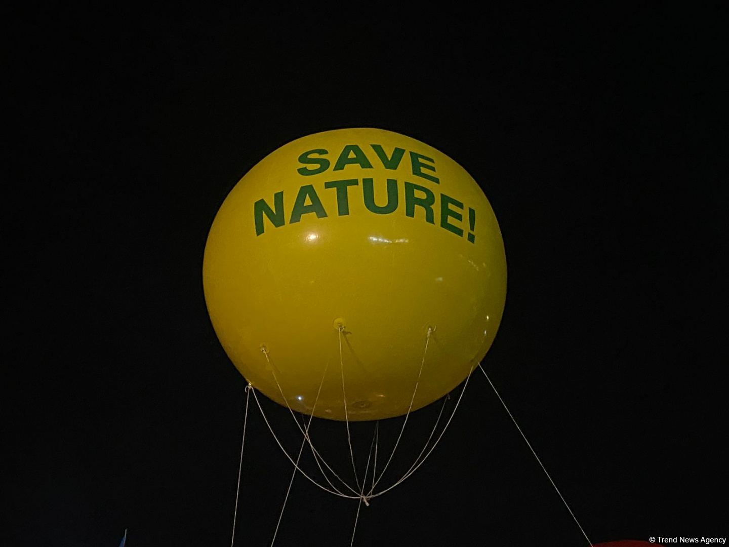Azerbaijani peaceful protesters raise big balloon with 'Stop ecocide' written on it, on Shusha-Khankandi road (PHOTO)