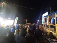 Participants of rally watch address of President Ilham Aliyev to people of Azerbaijan (PHOTO)