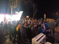 Participants of rally watch address of President Ilham Aliyev to people of Azerbaijan (PHOTO)