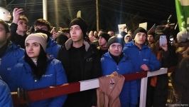 Participants of rally watch address of President Ilham Aliyev to people of Azerbaijan (PHOTO)