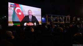 Participants of rally watch address of President Ilham Aliyev to people of Azerbaijan (PHOTO)