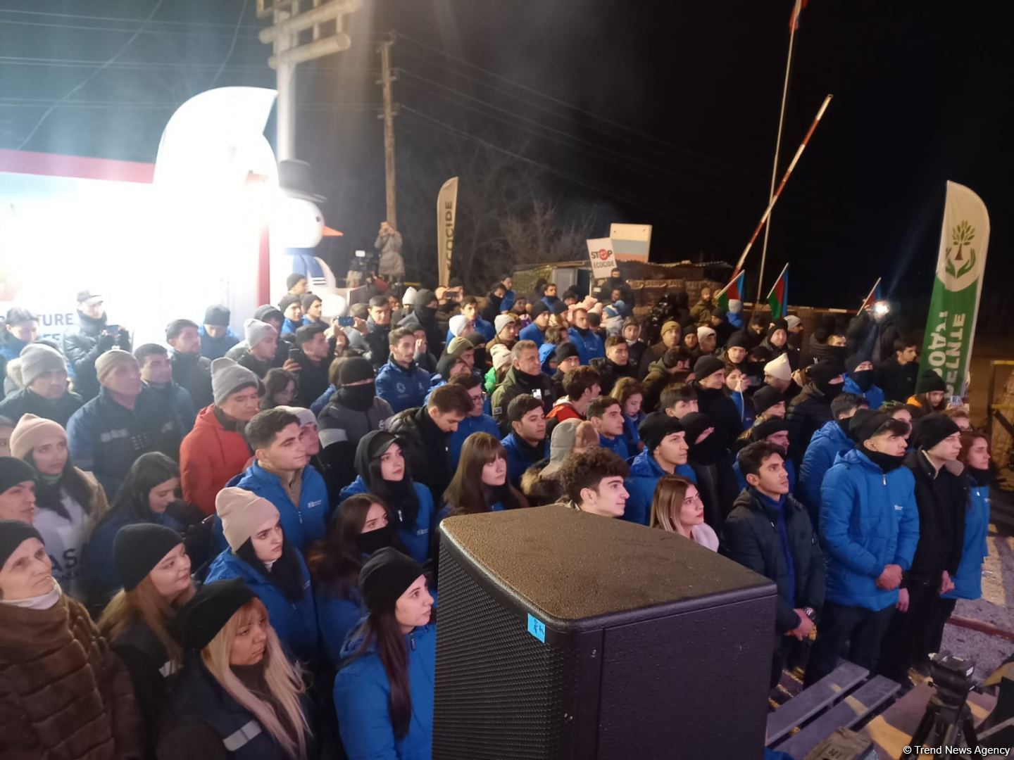 Participants of rally watch address of President Ilham Aliyev to people of Azerbaijan (PHOTO)