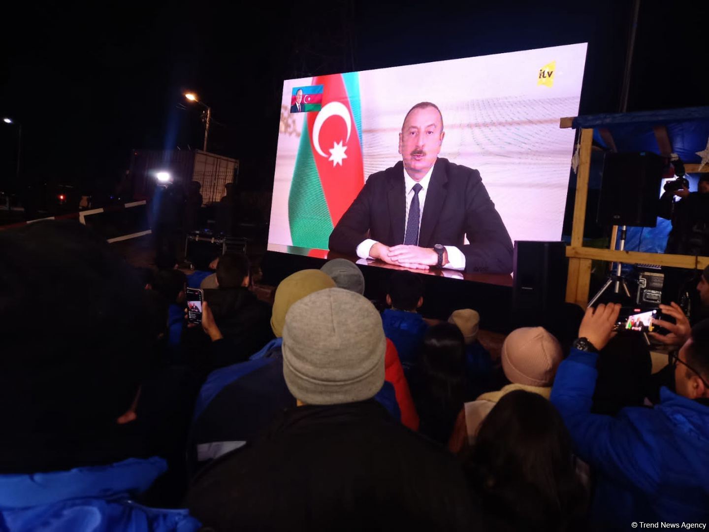 Participants of rally watch address of President Ilham Aliyev to people of Azerbaijan (PHOTO)