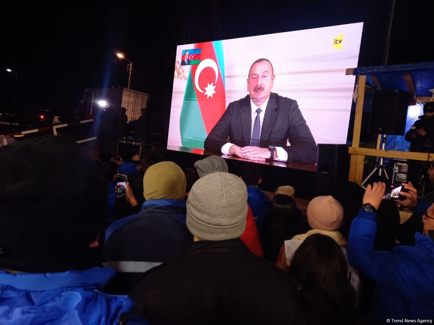 Participants of rally watch address of President Ilham Aliyev to people of Azerbaijan (PHOTO)
