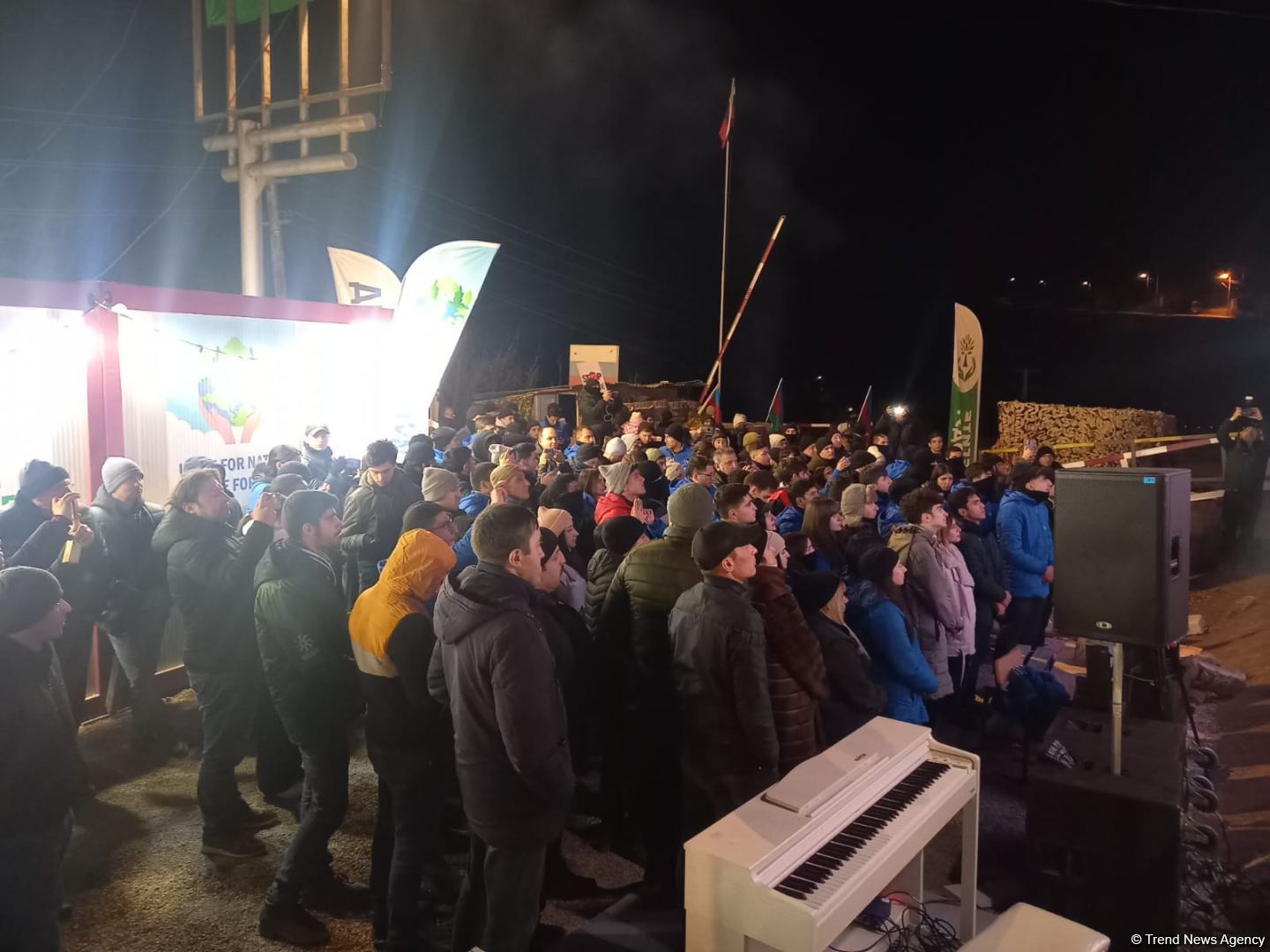 Participants of rally watch address of President Ilham Aliyev to people of Azerbaijan (PHOTO)