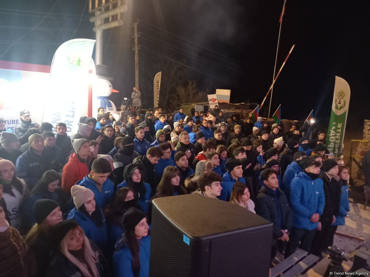 Participants of rally watch address of President Ilham Aliyev to people of Azerbaijan (PHOTO)