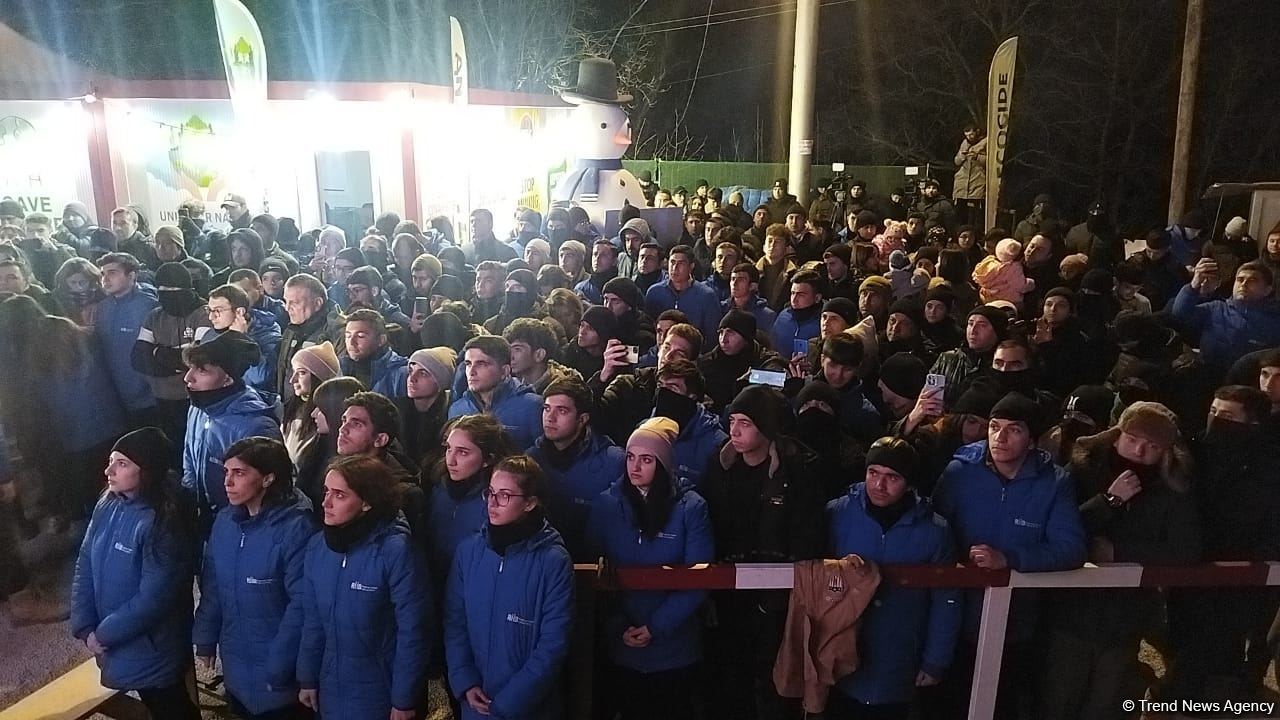 Participants of rally watch address of President Ilham Aliyev to people of Azerbaijan (PHOTO)