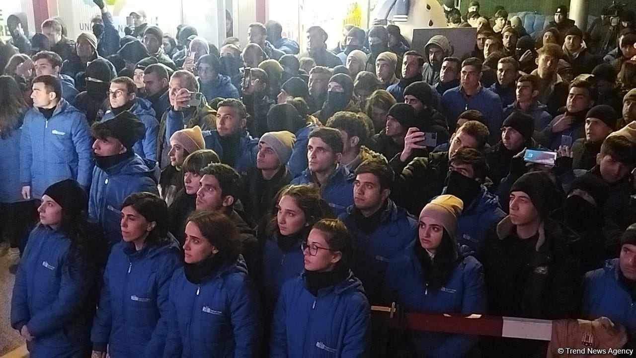 Participants of rally watch address of President Ilham Aliyev to people of Azerbaijan (PHOTO)