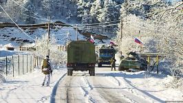 Ambulance, vehicle of Russian peacekeepers pass along Azerbaijan's Lachin-Khankendi road (PHOTO)