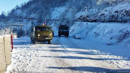 Ambulance, vehicle of Russian peacekeepers pass along Azerbaijan's Lachin-Khankendi road (PHOTO)