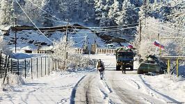 Ambulance, vehicle of Russian peacekeepers pass along Azerbaijan's Lachin-Khankendi road (PHOTO)
