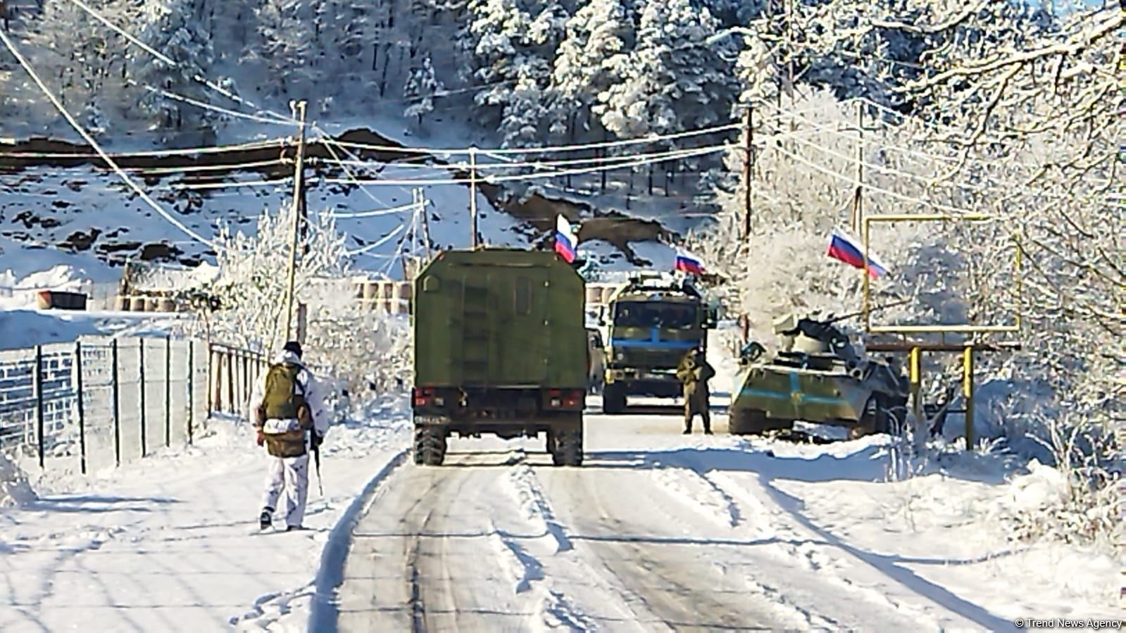 Ambulance, vehicle of Russian peacekeepers pass along Azerbaijan's Lachin-Khankendi road (PHOTO)