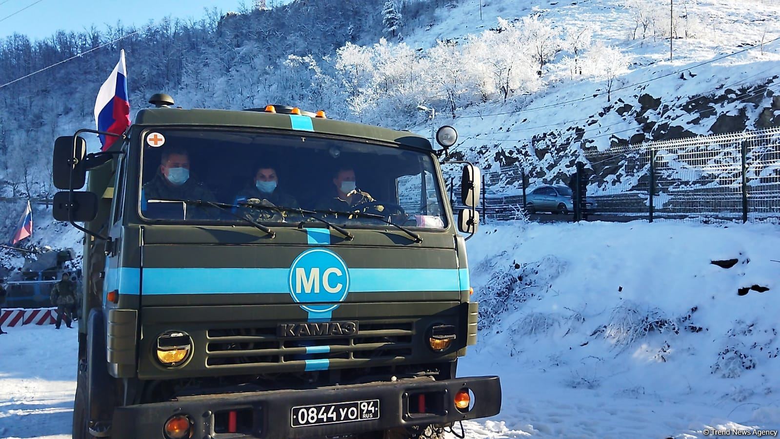 Ambulance, vehicle of Russian peacekeepers pass along Azerbaijan's Lachin-Khankendi road (PHOTO)