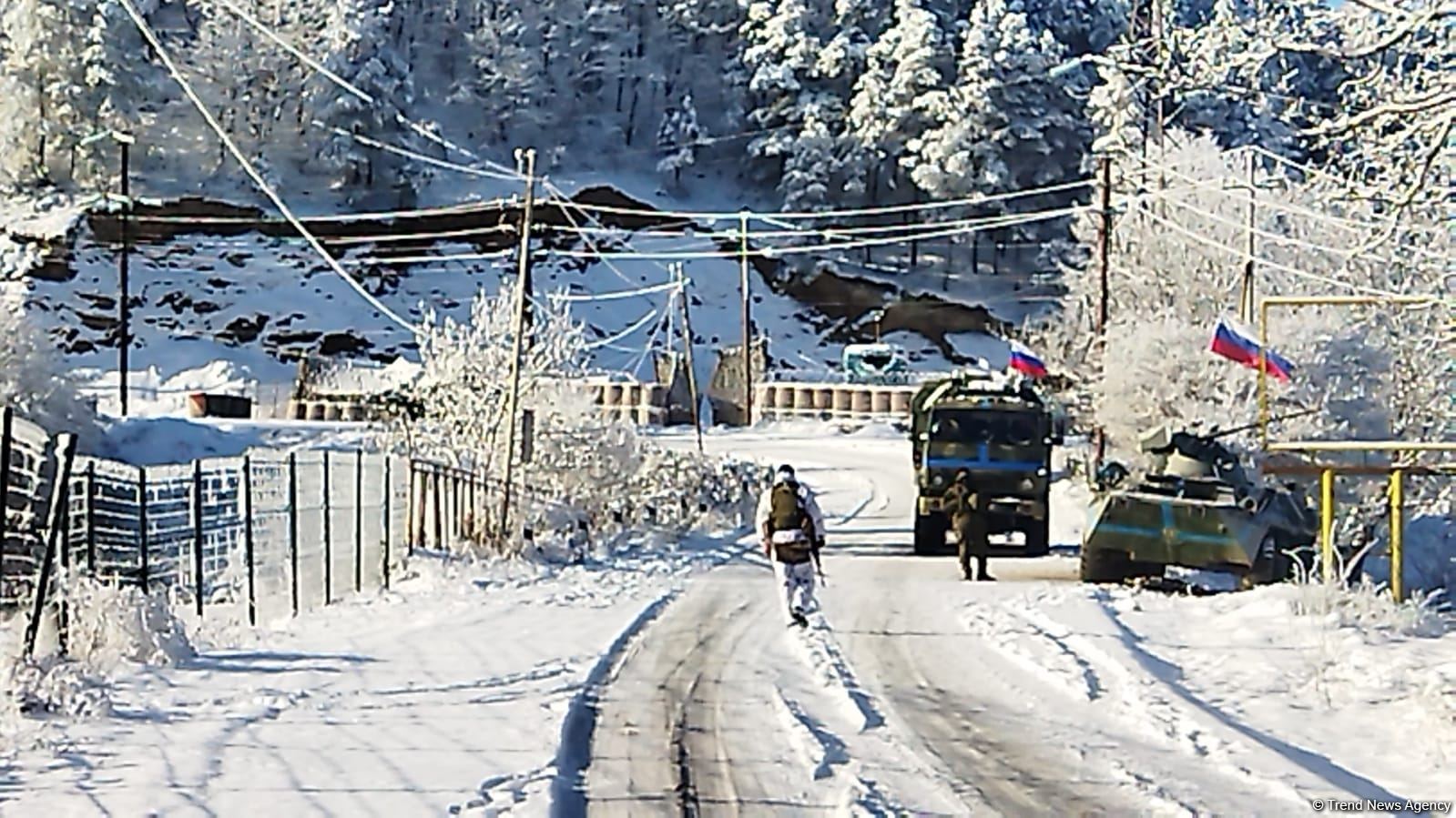 Ambulance, vehicle of Russian peacekeepers pass along Azerbaijan's Lachin-Khankendi road (PHOTO)