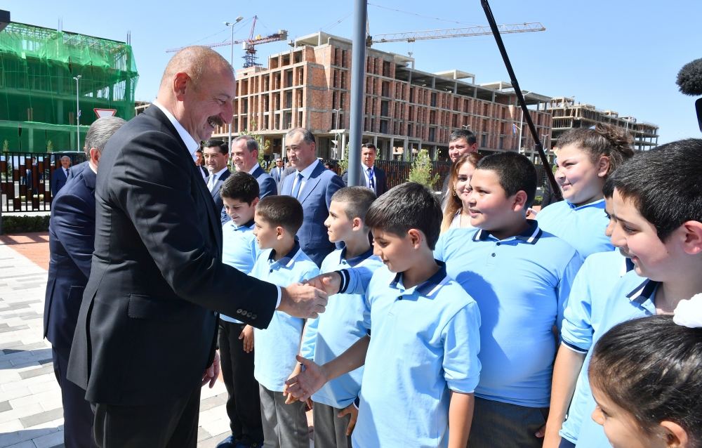President Ilham Aliyev, First Lady Mehriban Aliyeva, President Shavkat Mirziyoyev, his spouse  attend opening of secondary school in Fuzuli (PHOTO/VIDEO)