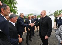 President Ilham Aliyev, First Lady Mehriban Aliyeva meet residents who relocated to Khojaly city (PHOTO/VIDEO)