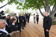 President Ilham Aliyev, First Lady Mehriban Aliyeva meet residents who relocated to Khojaly city (PHOTO/VIDEO)