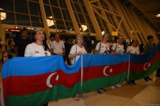 Azerbaijani team successfully performed at Olympic Games returns home (PHOTO/VIDEO)