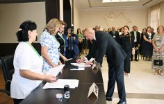 President Ilham Aliyev, First Lady Mehriban Aliyeva, their daughter Leyla Aliyeva cast votes in parliamentary elections (PHOTO/VIDEO)