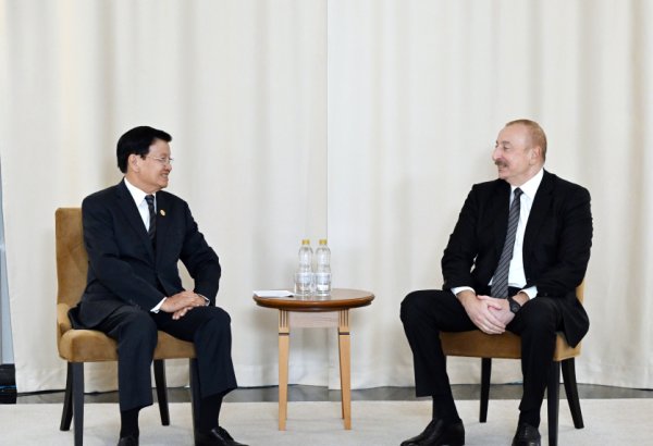 President Ilham Aliyev meets President of Laos in Russia's Kazan (PHOTO/VIDEO)