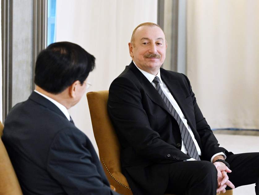 President Ilham Aliyev meets President of Laos in Russia's Kazan (PHOTO/VIDEO)