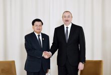 President Ilham Aliyev meets President of Laos in Russia's Kazan (PHOTO/VIDEO)