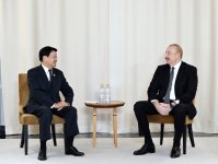 President Ilham Aliyev meets President of Laos in Russia's Kazan (PHOTO/VIDEO)