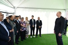 President Ilham Aliyev meets residents relocated to Beylik village in Lachin, presents keys to new homes (PHOTO/VIDEO)