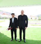 President Ilham Aliyev meets residents relocated to Beylik village in Lachin, presents keys to new homes (PHOTO/VIDEO)
