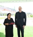 President Ilham Aliyev meets residents relocated to Beylik village in Lachin, presents keys to new homes (PHOTO/VIDEO)