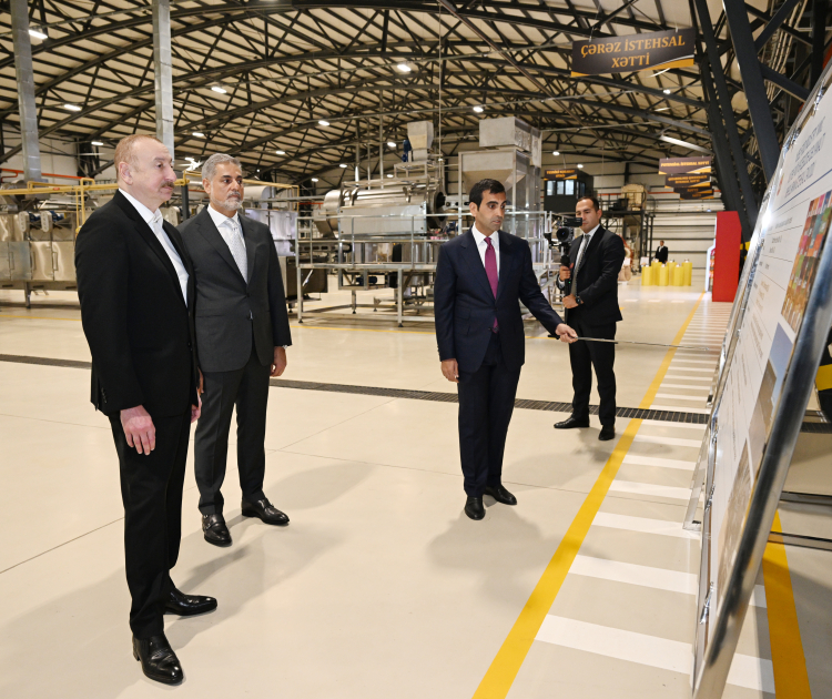 President Ilham Aliyev attends opening of snack production plant in Baku  (PHOTO)