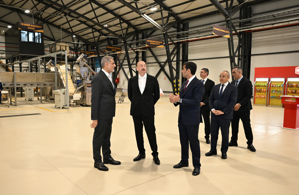 President Ilham Aliyev attends opening of snack production plant in Baku  (PHOTO)