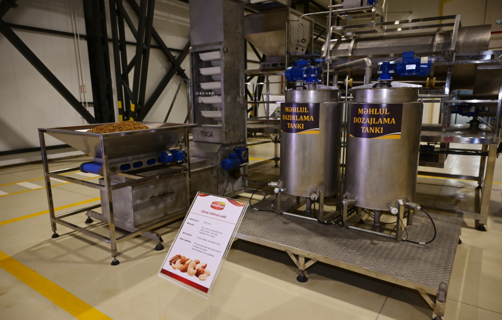 President Ilham Aliyev attends opening of snack production plant in Baku  (PHOTO)