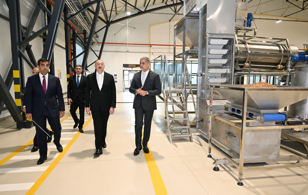 President Ilham Aliyev attends opening of snack production plant in Baku  (PHOTO)