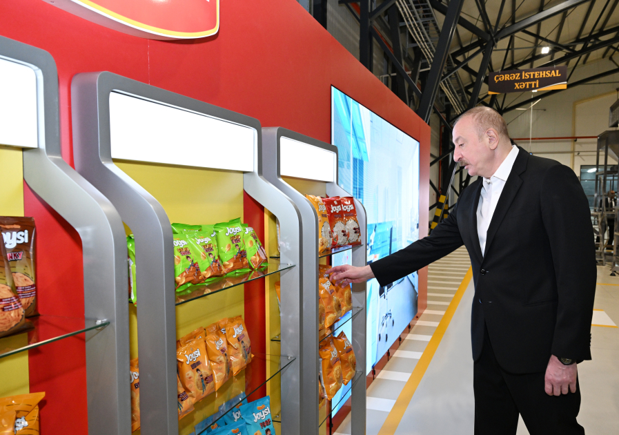 President Ilham Aliyev attends opening of snack production plant in Baku  (PHOTO)