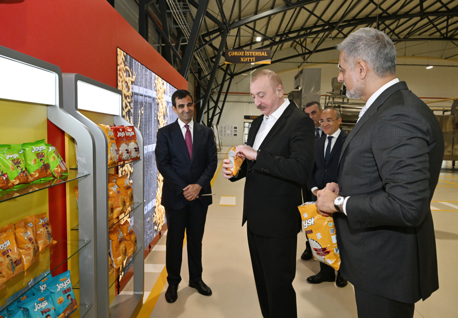 President Ilham Aliyev attends opening of snack production plant in Baku  (PHOTO)