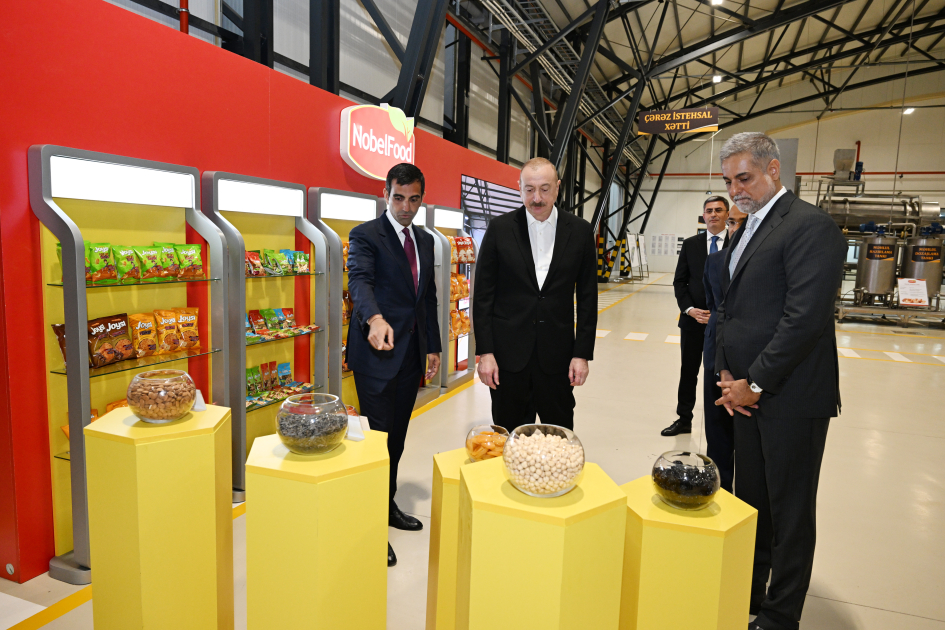 President Ilham Aliyev attends opening of snack production plant in Baku  (PHOTO)