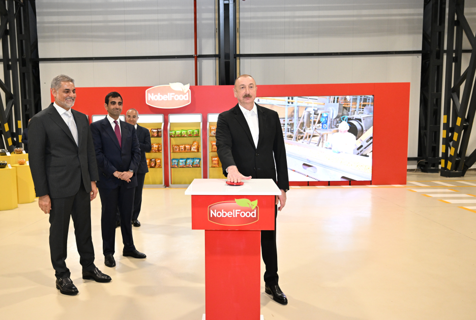President Ilham Aliyev attends opening of snack production plant in Baku  (PHOTO)