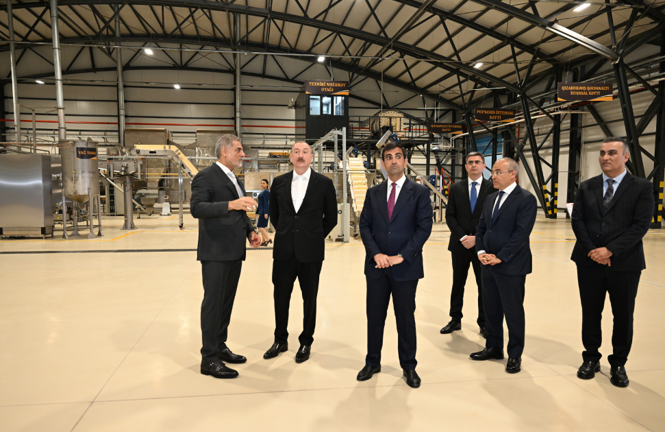 President Ilham Aliyev attends opening of snack production plant in Baku  (PHOTO)