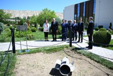 President Ilham Aliyev, int'l guests visit area of plant targeted by Armenian missile attack during Patriotic War (PHOTO)