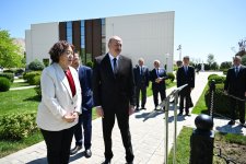 President Ilham Aliyev, int'l guests visit area of plant targeted by Armenian missile attack during Patriotic War (PHOTO)