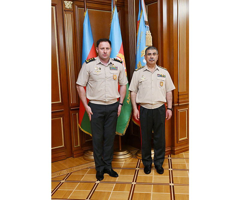 Azerbaijani Defense Minister meets service members receiving high military ranks (PHOTO)