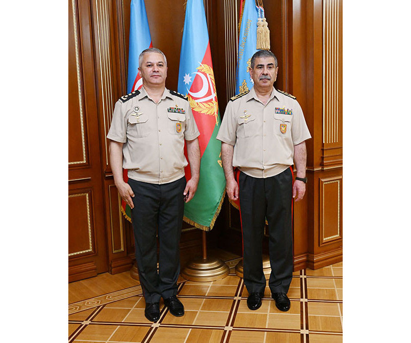 Azerbaijani Defense Minister meets service members receiving high military ranks (PHOTO)